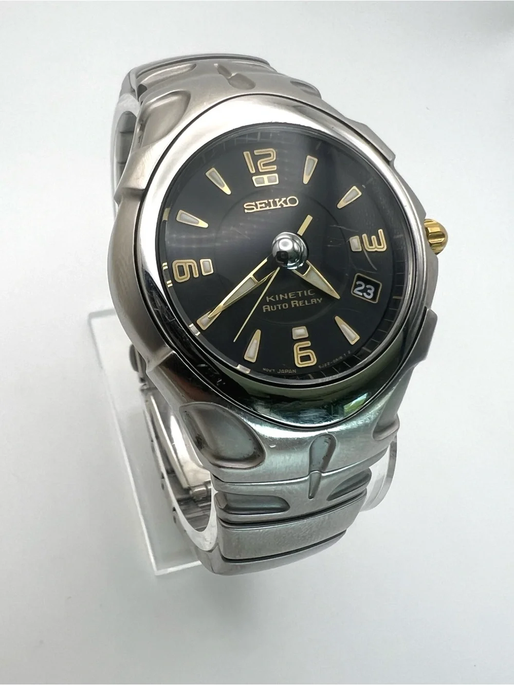 Seiko Kinetic Auto Relay Black Dial Stainless Steel Watch with Gold Accents